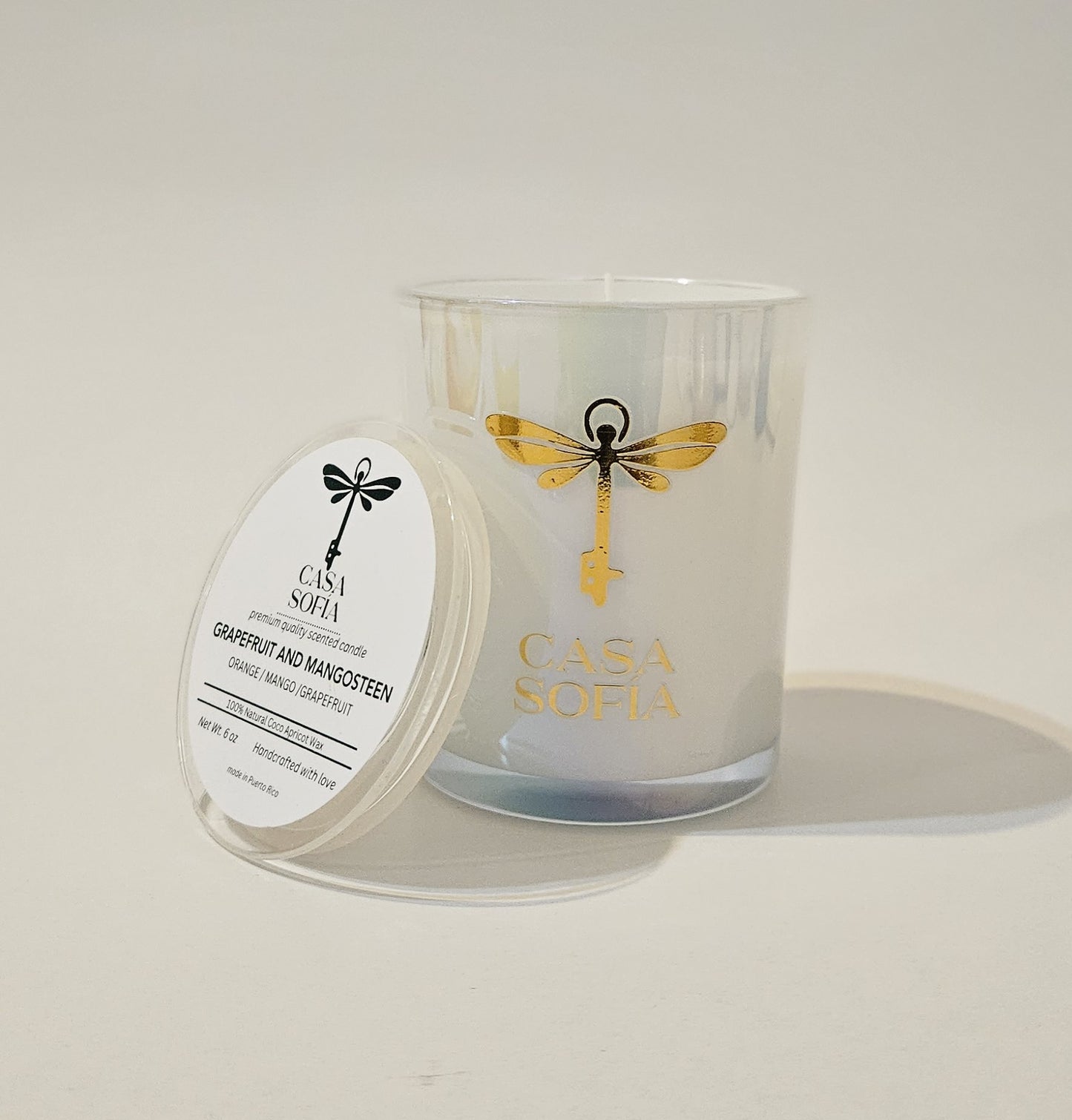Grapefruit and Mangosteen •Orange / Mango / Grapefruit • Vela aromática
