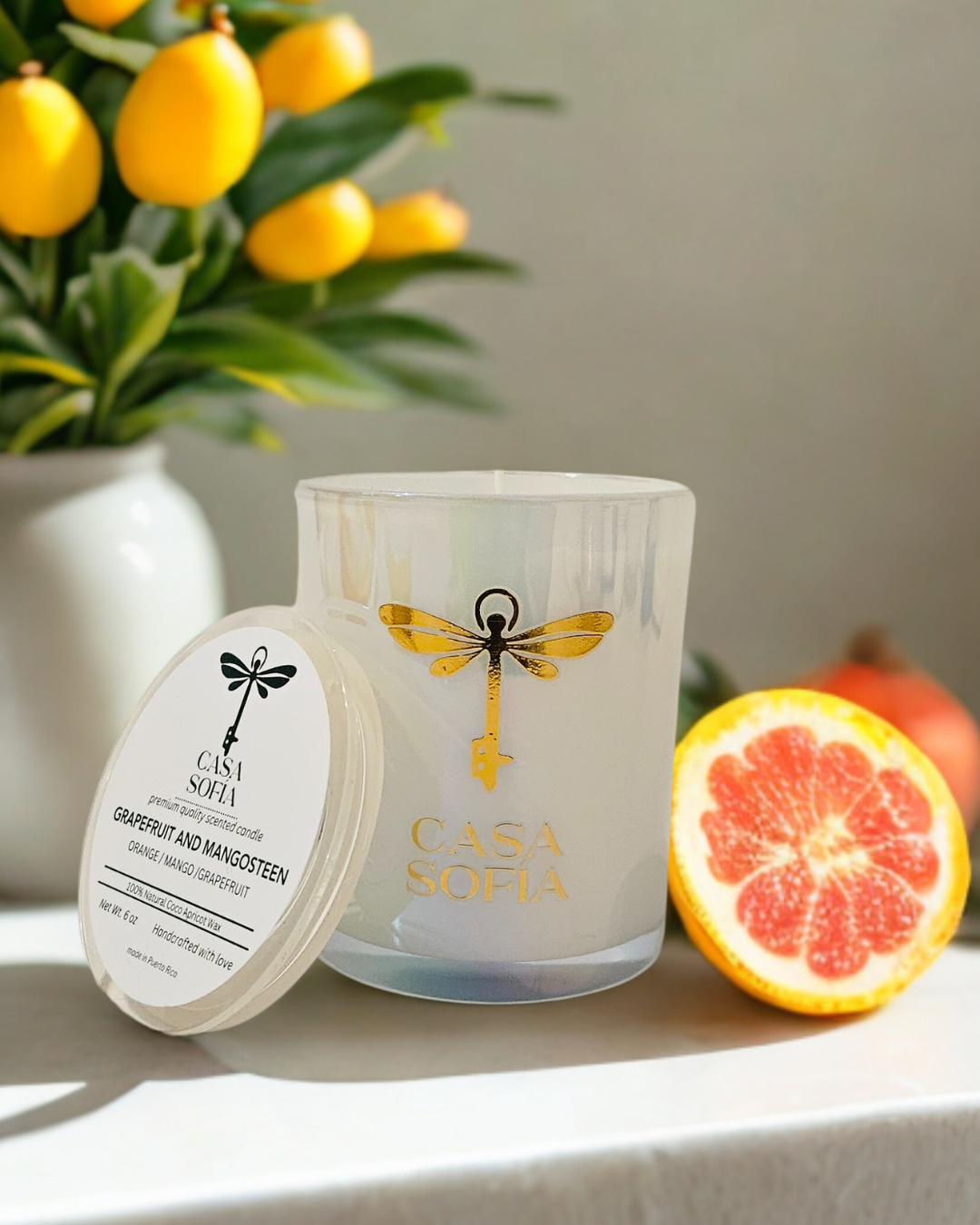 Grapefruit and Mangosteen •Orange / Mango / Grapefruit • Vela aromática