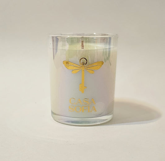 Vela artesanal de violeta-rosa-raspberry en envase reciclable